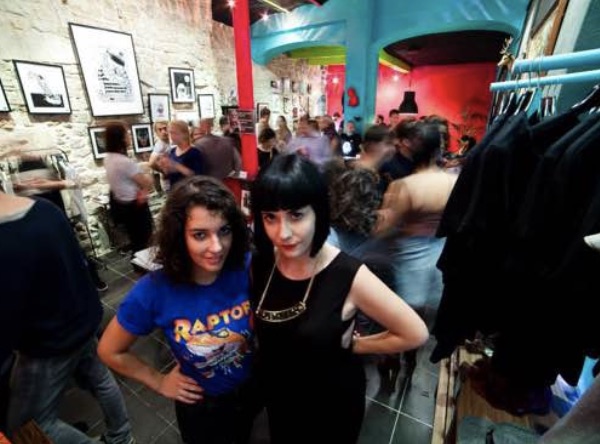 Monica and Holy Hole co-founder posing at the studio store